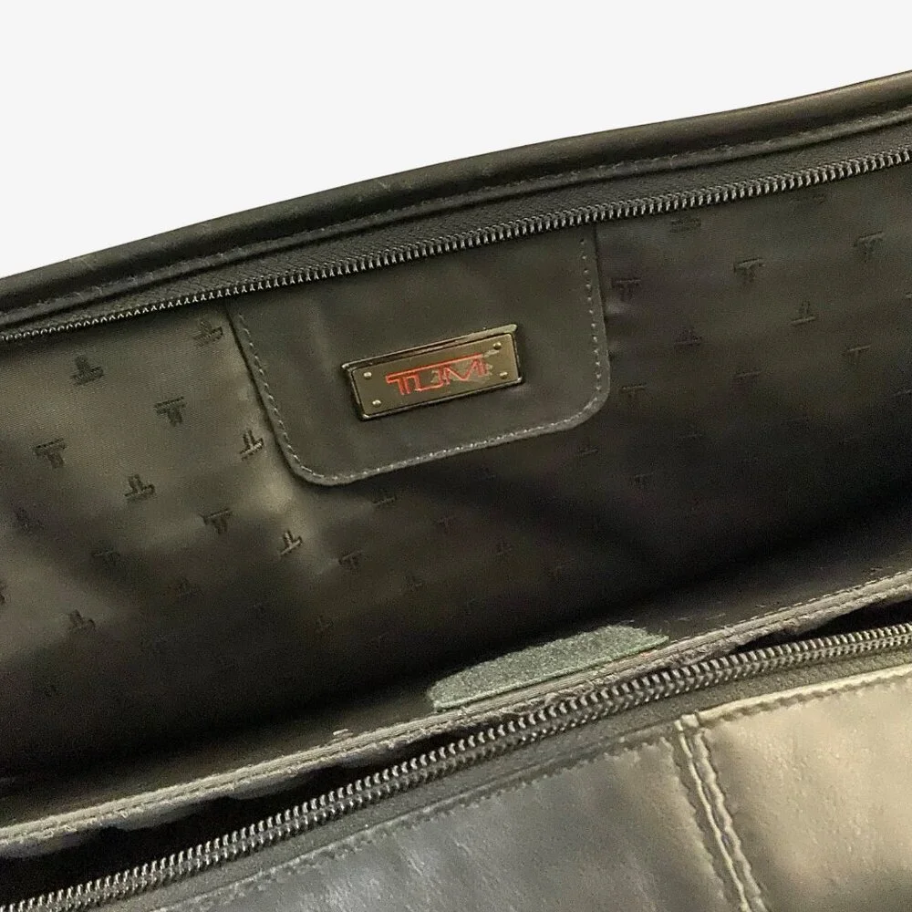 TUMI Black Leather Laptop Briefcase with Multiple Compartments